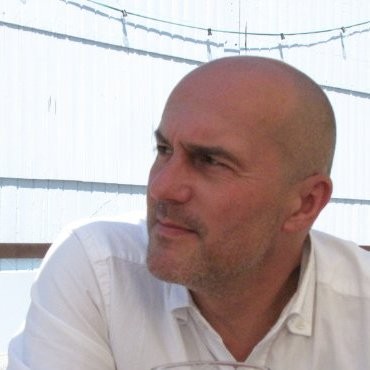 Dr. Emmanuel  Barra